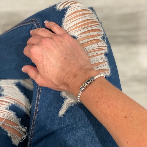 Stretchy silver beaded bracelet - Picture 2 of 2